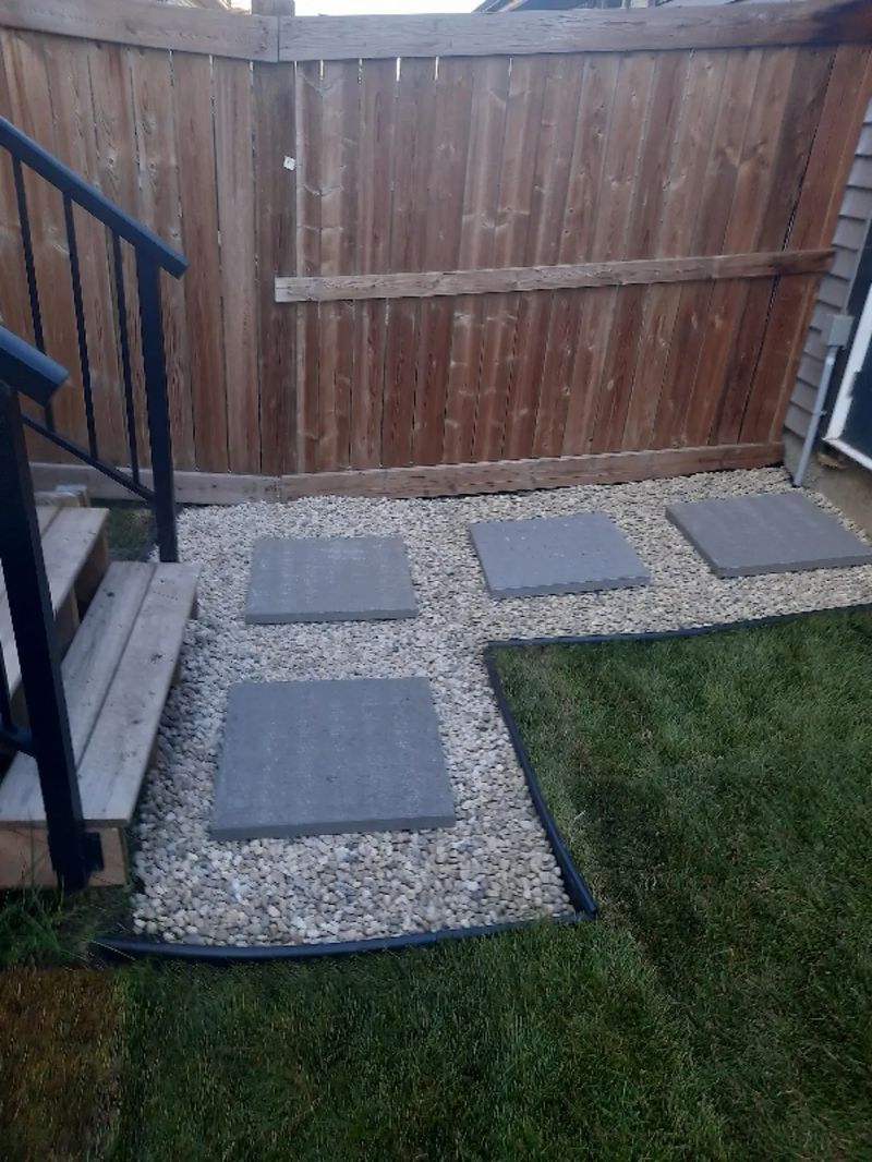 Gravel walkway with paver stepping stones